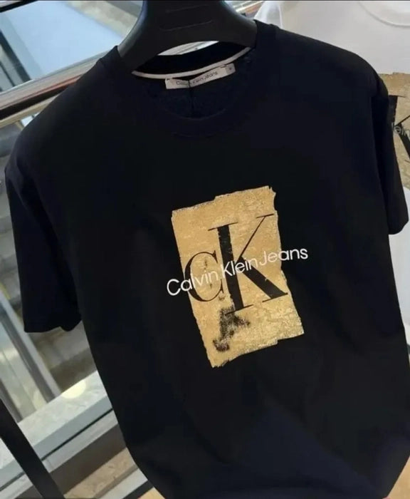 Black t-shirt with Calvin Klein Jeans logo on a hanger