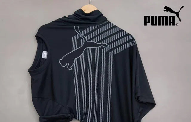 Black sleeveless jacket with white stripes and Puma logo on a gray background