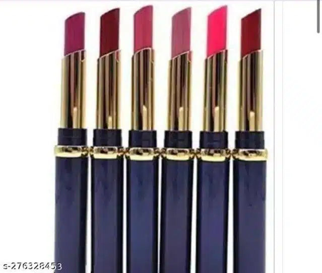 Set of six lipsticks with gold caps on a white background