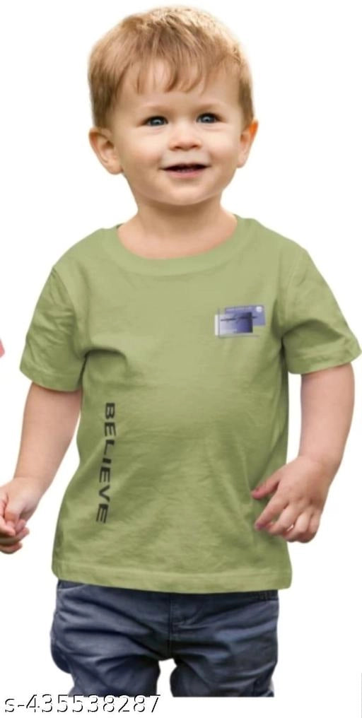 Child wearing a green t-shirt with text on a white background